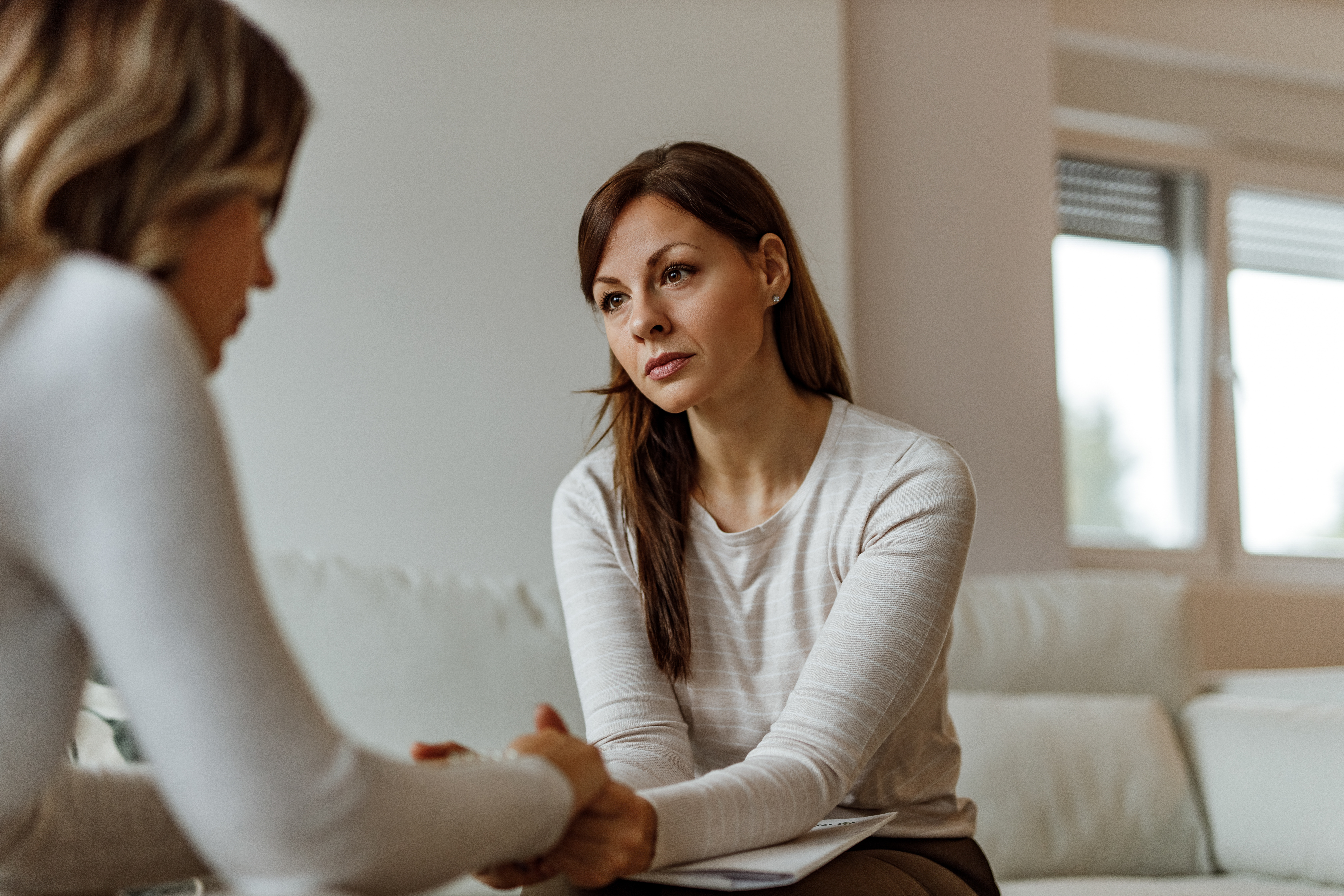 Woman giving emotional support to another